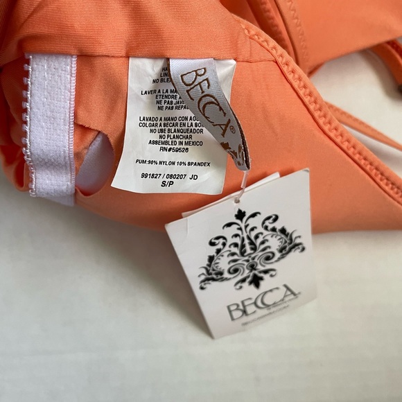 Becca
Solid V-Neck One-
Piece Swimsuit - Picture 3 of 4